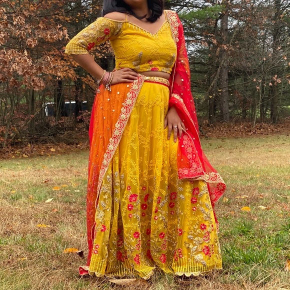yellow dress with red dupatta